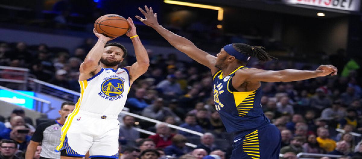 Curry's three-point shooting was hot, scoring 40 points and leading the Warriors to a narrow win over the Nets