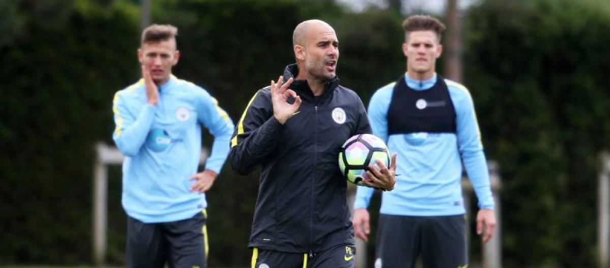 Manchester City coach Guardiola calls on fans to fully support the team's pursuit of Champions League qualification