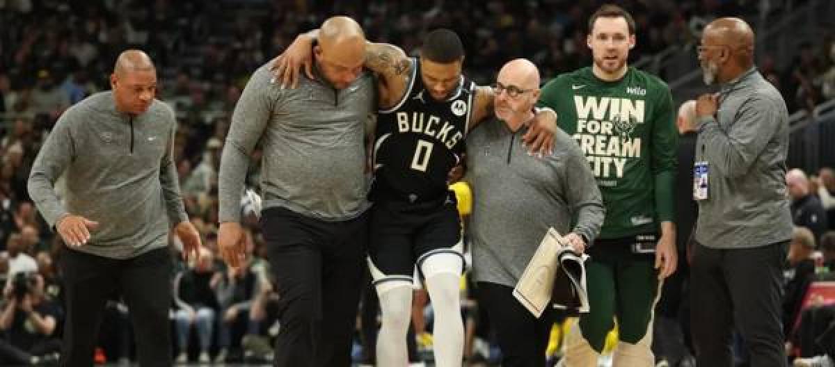 Damian Lillard torn left Achilles tendon, season overdue Damian Lillard torn left Achilles tendon, season overdue