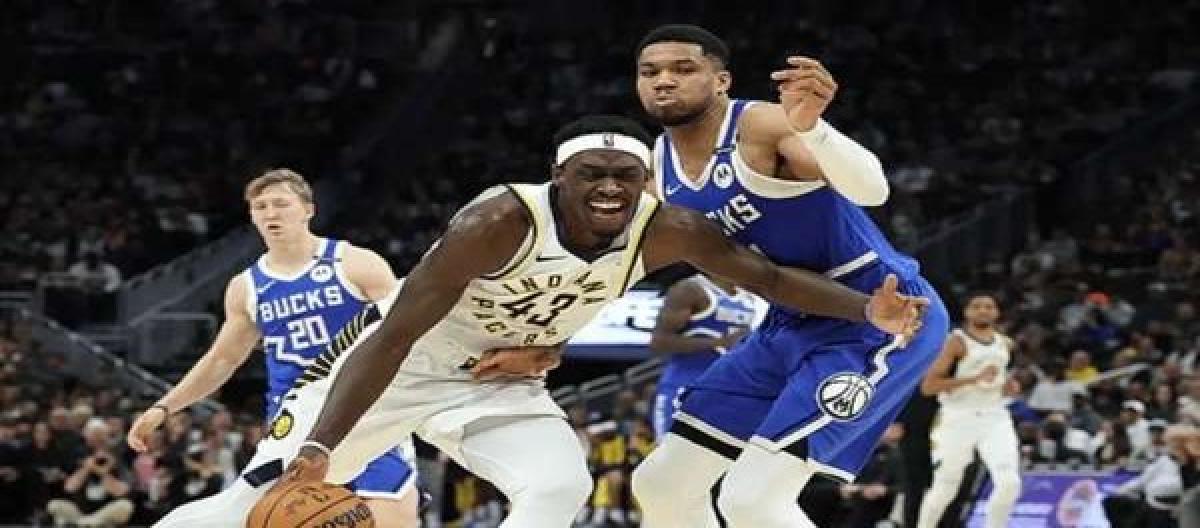 Turner scored 21 points and 9 rebounds to help the Pacers eliminate the Bucks in overtime.