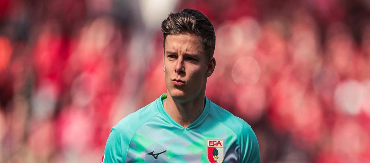 Augsburg goalkeeper Finn Dahmen's contract automatically extended by one year due to reaching the required number of appearances