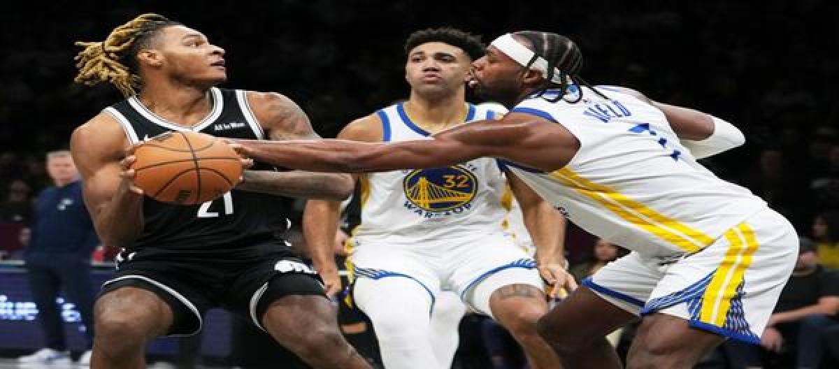 Curry scored 27 points as the Warriors defeated the Nets 120-107.