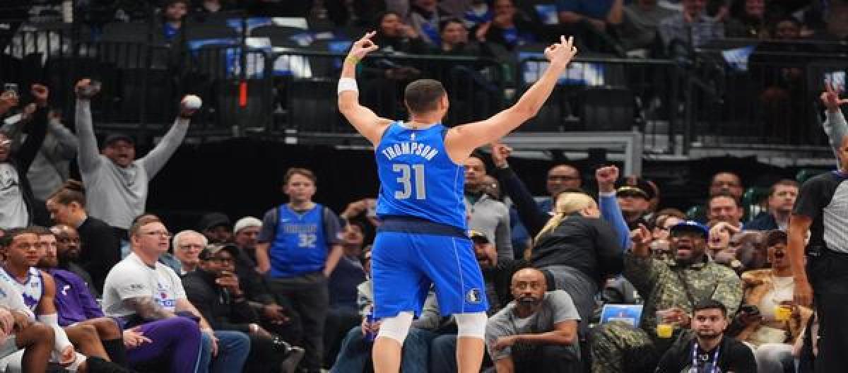 Klay Thompson's 26 points shone as the Mavericks defeated the Jazz 144-122.