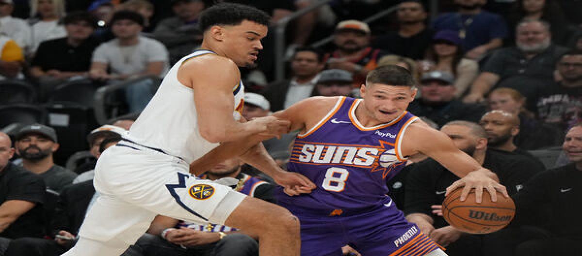 Booker's 22 points weren't enough to save the Nuggets from a narrow 125-123 victory over the Suns.