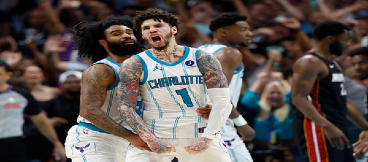 Ball scored 30 points and Richis added 28, as the Hornets narrowly defeated the Heat 127-126 in overtime.
