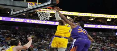 Reeves' 28 points and 16 rebounds sealed the Lakers' 116-115 victory over the Timberwolves at the buzzer.