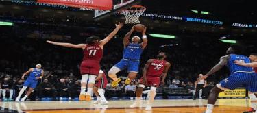 Bencaro scored 31 points, giving the Magic a 133-124 victory over the Heat.