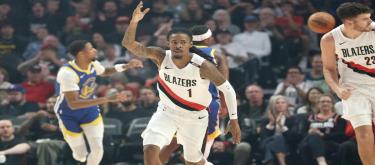 Kelly's 24 points weren't enough to secure a 123-118 victory for the Trail Blazers over the Warriors.