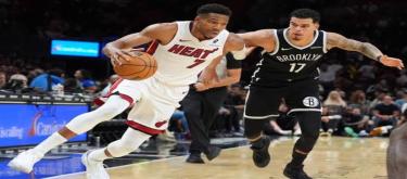 Michael Porter Jr.'s 27 points weren't enough to secure a 144-128 victory for the Heat over the Nets.