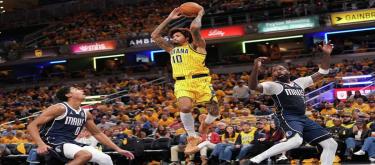Kyrie Irving scored 24 points and Washington added 20, as the Mavericks defeated the Pacers 121-105.